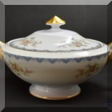 P12. Porcelain serving dish with lid. 